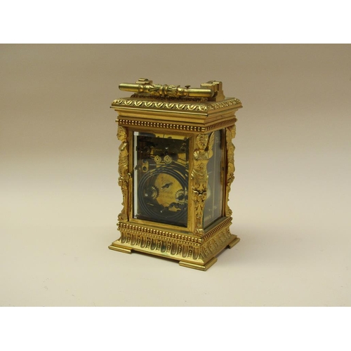 34 - A late 19c French carriage clock, the movement striking on a gong, and with an alarm and having a si... 