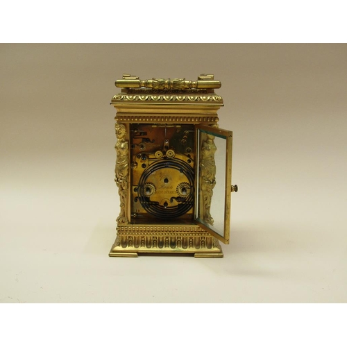 34 - A late 19c French carriage clock, the movement striking on a gong, and with an alarm and having a si... 