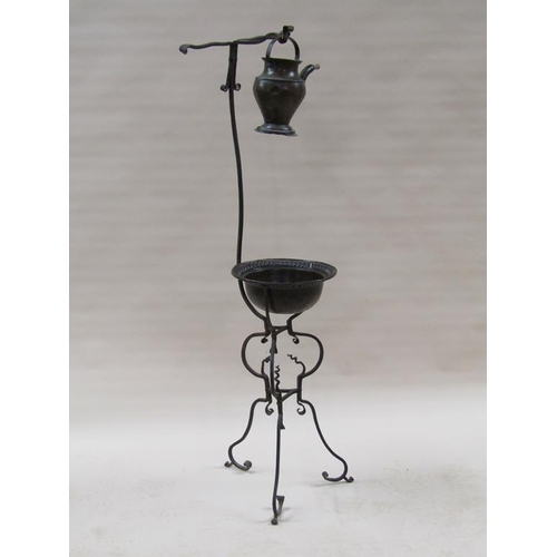 59 - An 18c Continental wash stand of wrought iron construction with a copper wash bowl and water jug, th... 