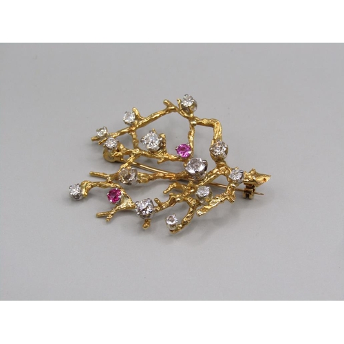 103 - A gold diamond and ruby set rustic branch brooch, 4.5cm w.