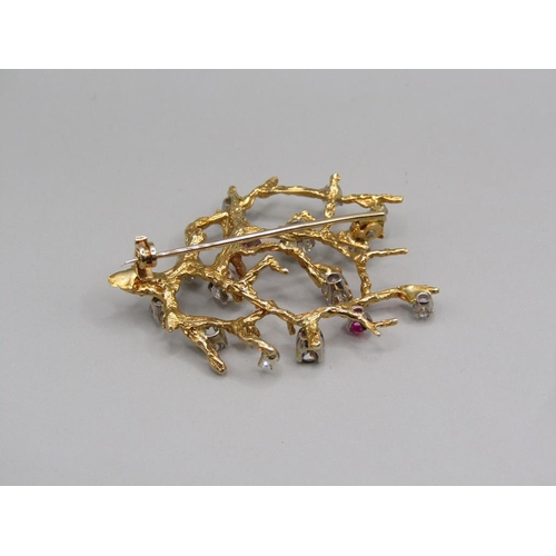 103 - A gold diamond and ruby set rustic branch brooch, 4.5cm w.