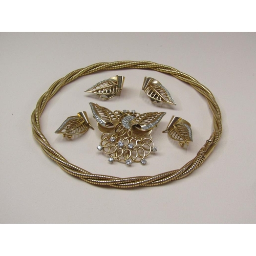 106 - A suite of 18ct gold diamond set jewellery comprising a rope twist necklace with a diamond set butte... 