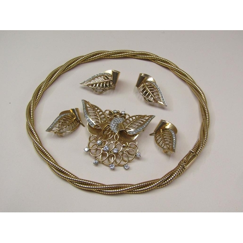 106 - A suite of 18ct gold diamond set jewellery comprising a rope twist necklace with a diamond set butte... 