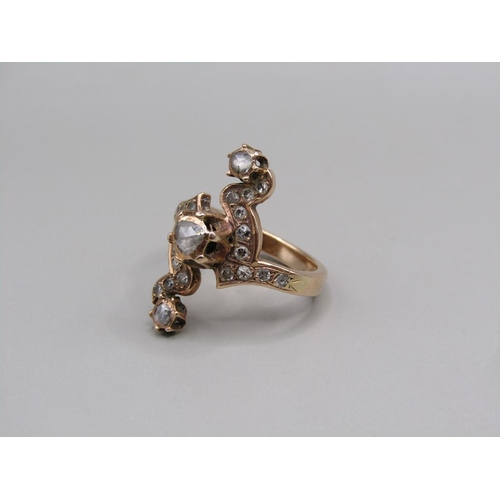 107 - A gold diamond set ring, size M.