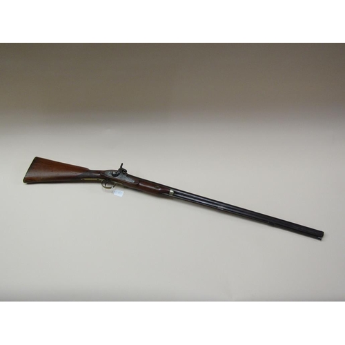 12 - An English percussion sporting gun, c.1830/40, walnut stock, brass trigger guard, 32.5in barrel.