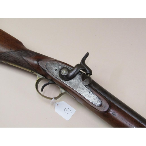 12 - An English percussion sporting gun, c.1830/40, walnut stock, brass trigger guard, 32.5in barrel.