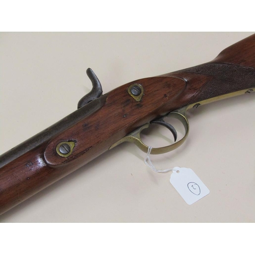 12 - An English percussion sporting gun, c.1830/40, walnut stock, brass trigger guard, 32.5in barrel.