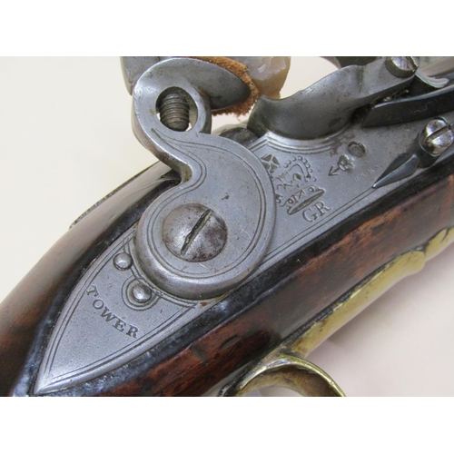 17 - An early 19c flintlock pistol, c.1820, with tower proofs and stamped with crowned GR and Tower, 9in ... 