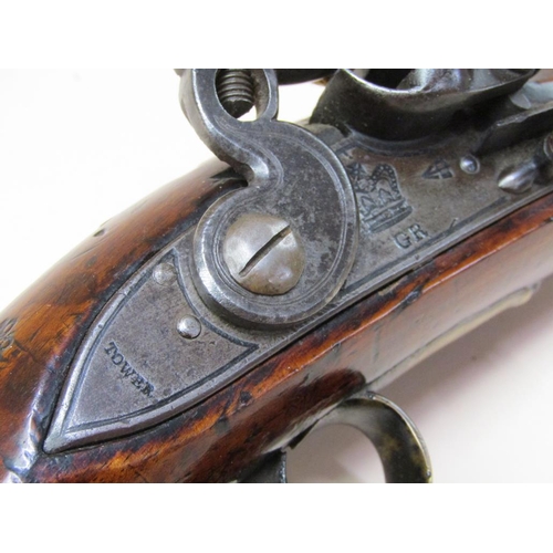 18 - An early 19c flintlock pistol, c.1820, with Tower proofs and stamped with crowned GR and Tower, 9in ... 