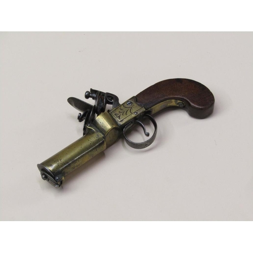 24 - A late 18c flintlock brass and steel tinder lighter pistol, 7in long.