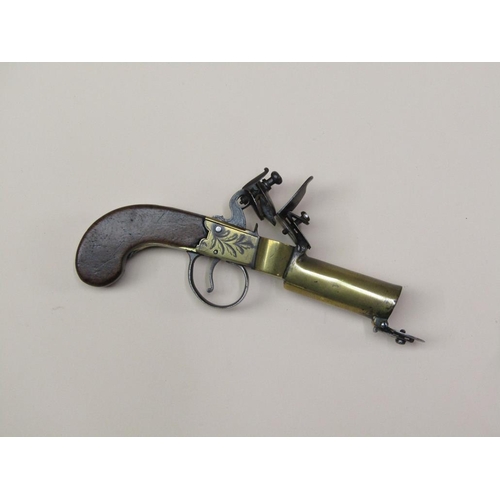 24 - A late 18c flintlock brass and steel tinder lighter pistol, 7in long.