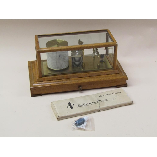 50 - A Negretti & Zambra barograph named 'The Regency' and sold in 1975, the chamber having 12 fold bello... 