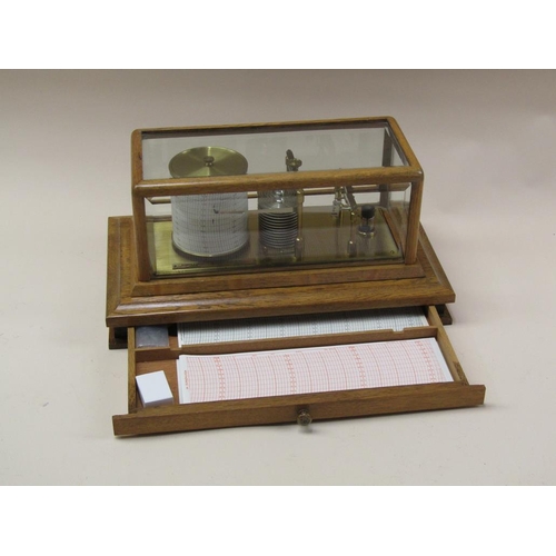 50 - A Negretti & Zambra barograph named 'The Regency' and sold in 1975, the chamber having 12 fold bello... 