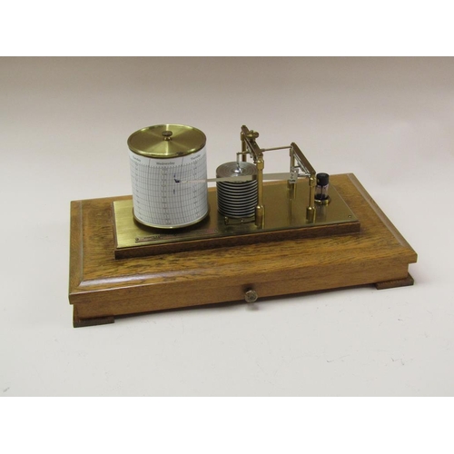 50 - A Negretti & Zambra barograph named 'The Regency' and sold in 1975, the chamber having 12 fold bello... 