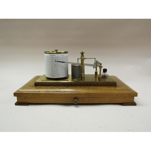 50 - A Negretti & Zambra barograph named 'The Regency' and sold in 1975, the chamber having 12 fold bello... 