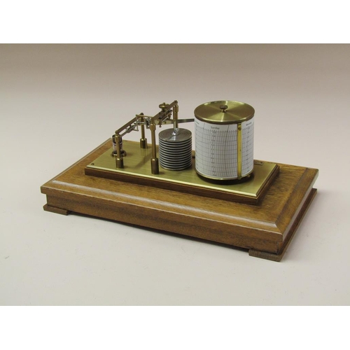 50 - A Negretti & Zambra barograph named 'The Regency' and sold in 1975, the chamber having 12 fold bello... 