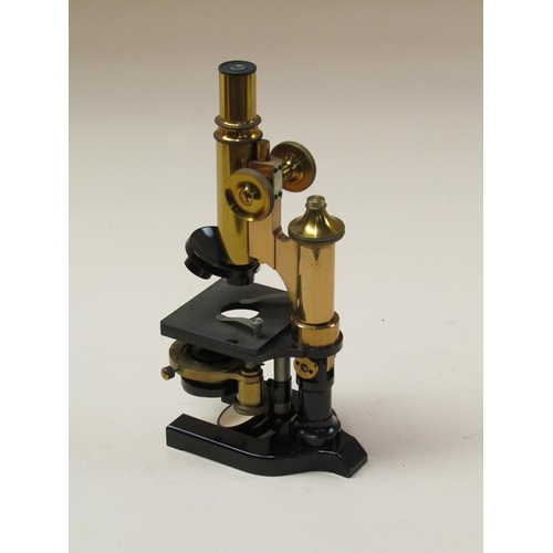 51 - An early 20c monocular microscope signed Ross London, no.9005 with substage condenser and rotating f... 