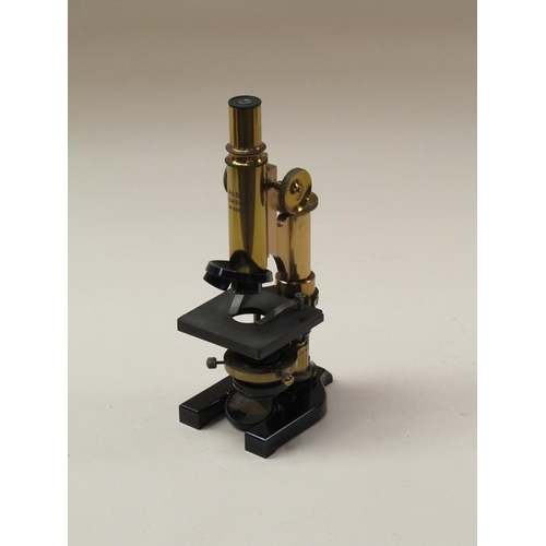 51 - An early 20c monocular microscope signed Ross London, no.9005 with substage condenser and rotating f... 