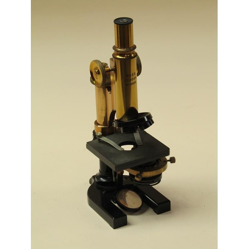 51 - An early 20c monocular microscope signed Ross London, no.9005 with substage condenser and rotating f... 