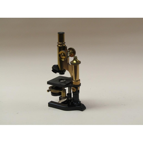 51 - An early 20c monocular microscope signed Ross London, no.9005 with substage condenser and rotating f... 