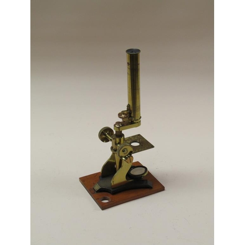 52 - A late 19c Society of Arts prize model educational microscope with a single objective and plain stag... 