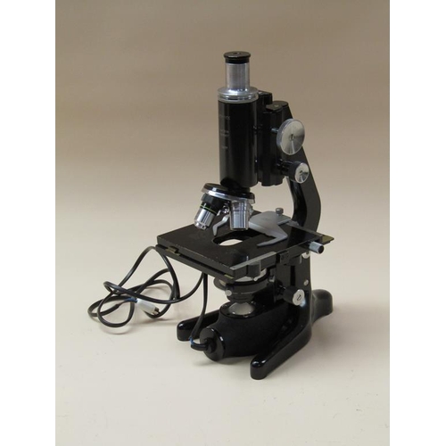 54 - A mid 20c monocular microscope, the 'Service' model by Watson of Barnet numbered 138077.  The black ... 