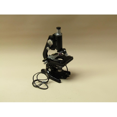 54 - A mid 20c monocular microscope, the 'Service' model by Watson of Barnet numbered 138077.  The black ... 