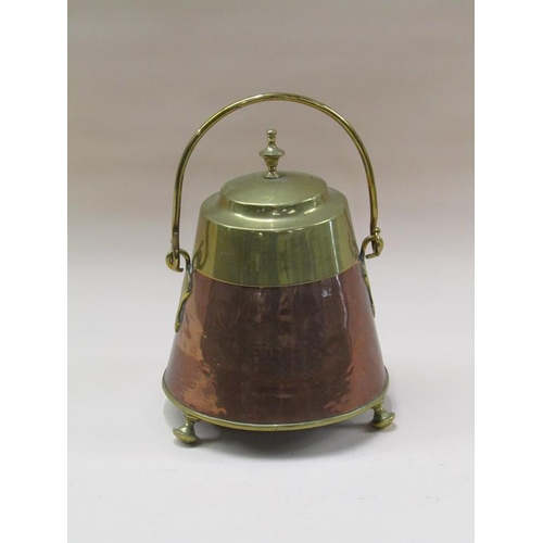 60 - A 19c Dutch copper and brass milk can of circular tapering form with a swing handle and supported on... 