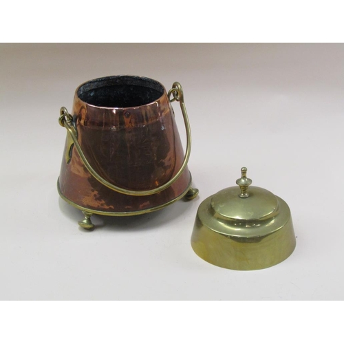 60 - A 19c Dutch copper and brass milk can of circular tapering form with a swing handle and supported on... 