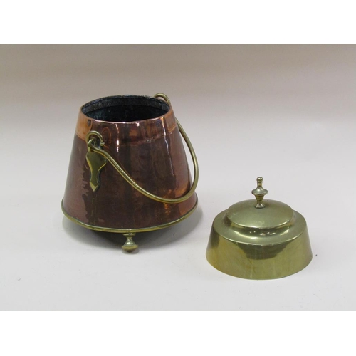 60 - A 19c Dutch copper and brass milk can of circular tapering form with a swing handle and supported on... 