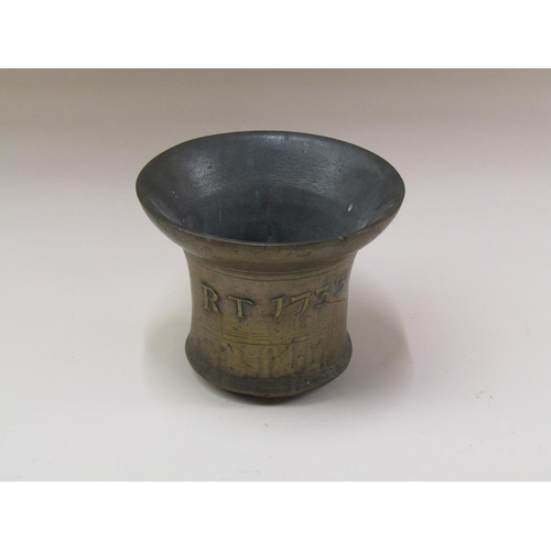 62 - An 18c bell metal mortar, cast 'RT 1733', with a 24cm  mouth, 20cm h.