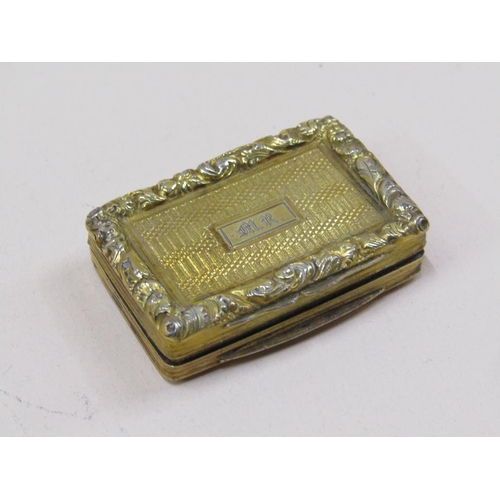 74 - A William IV silver gilt vinaigrette of rectangular form with a hinge cover, having a pierced grill,... 