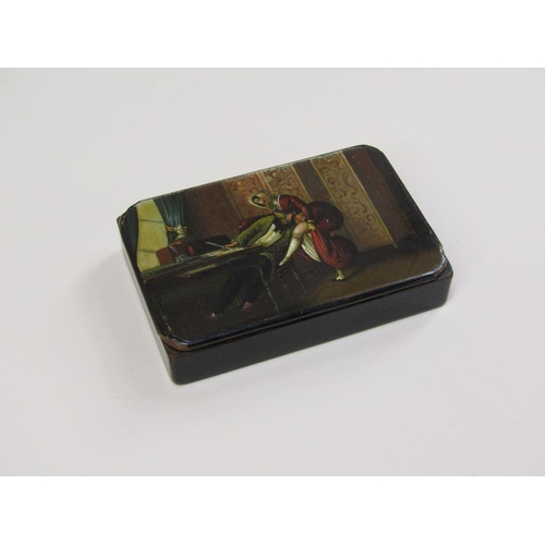 75 - An early 19c papier maché painted table snuff box with a semi erotic scene of a gentleman and a lady... 