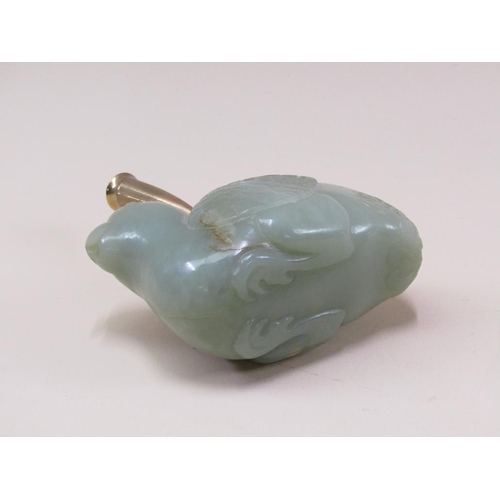 79 - An Oriental carved green stone figure of a seated bird, mounted with a 9ct gold dip well, marked Sam... 