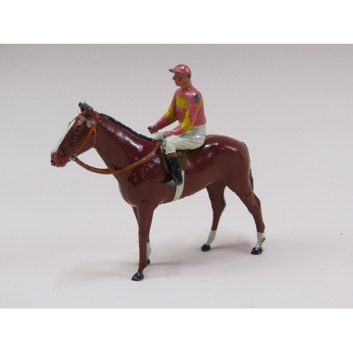 82 - A W Britain cold painted metal figure group of horse and jockey in Lord Rosebery colours, being mode... 