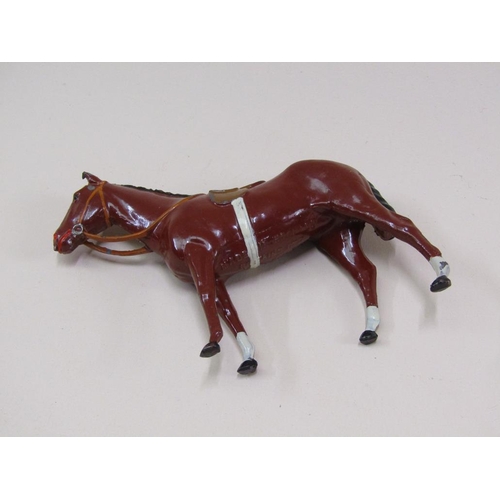 82 - A W Britain cold painted metal figure group of horse and jockey in Lord Rosebery colours, being mode... 