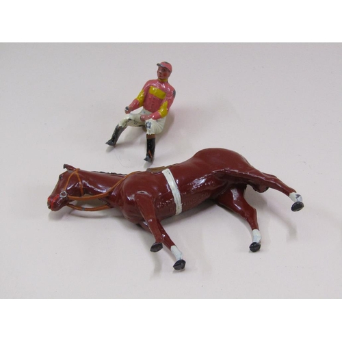 82 - A W Britain cold painted metal figure group of horse and jockey in Lord Rosebery colours, being mode... 