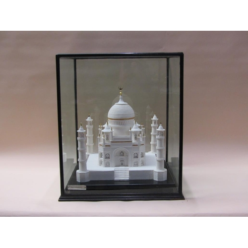 90 - A white sugar model of the Taj Mahal, on base, 38cm sq., 40cm h. in glass case.