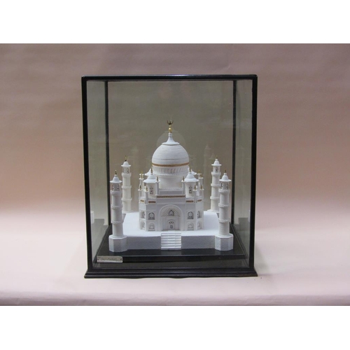 90 - A white sugar model of the Taj Mahal, on base, 38cm sq., 40cm h. in glass case.