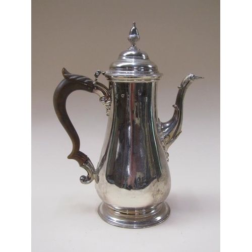 160 - A George II silver coffee pot of baluster form on a circular stepped base, London 1755, makers mark ... 