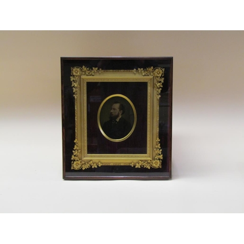 220 - A pair of late 19c/early 20c photogravures of a lady and a gentleman, oval framed in gilt floral enc... 