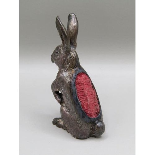 116 - An early 20c silver hare pin cushion, Sterling silver, seated, 7cm h.