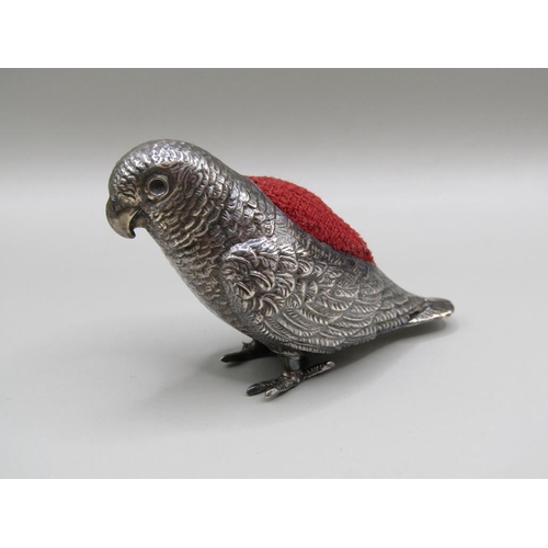 122 - A silver parrot pin cushion, Birmingham 1914, 6cm l, A/F.