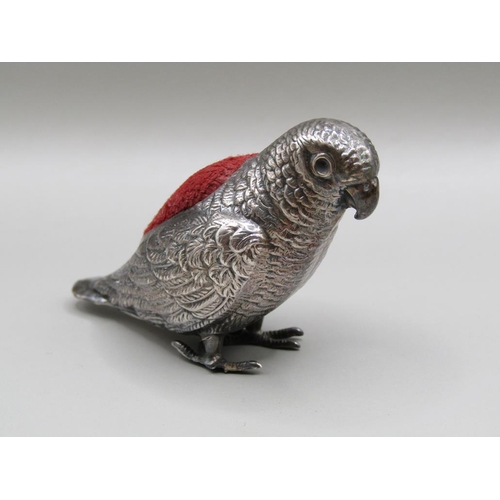 122 - A silver parrot pin cushion, Birmingham 1914, 6cm l, A/F.