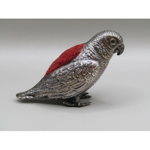 122 - A silver parrot pin cushion, Birmingham 1914, 6cm l, A/F.