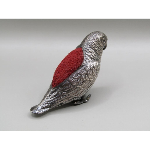 122 - A silver parrot pin cushion, Birmingham 1914, 6cm l, A/F.