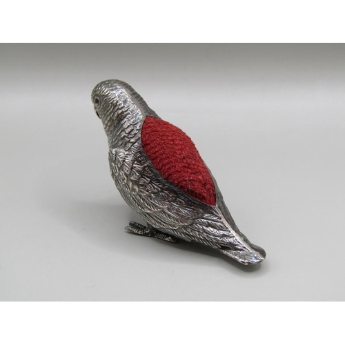 122 - A silver parrot pin cushion, Birmingham 1914, 6cm l, A/F.