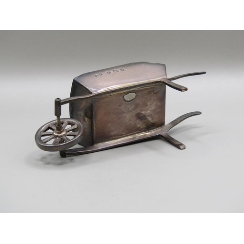 124 - A silver wheel barrow pin cushion, Birmingham 1908, 8.2cm l.