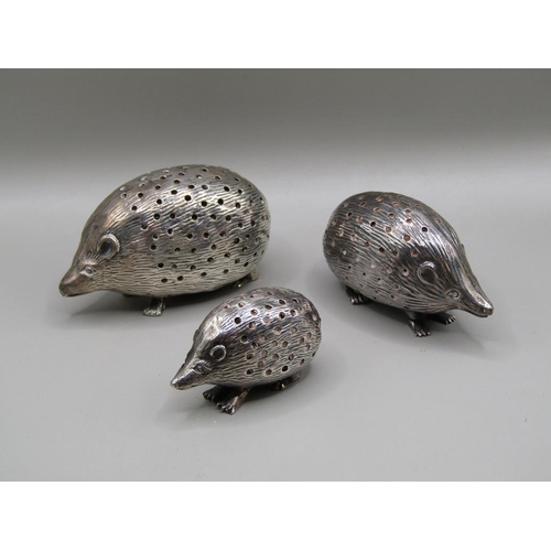 126 - Three silver hedgehog pin cushions, Birmingham 1903, 1904 & 1905, 7cm, 6cm & 4.5cm w.