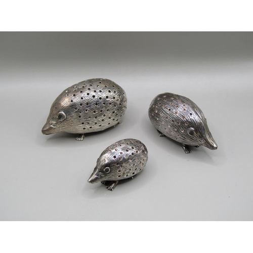 126 - Three silver hedgehog pin cushions, Birmingham 1903, 1904 & 1905, 7cm, 6cm & 4.5cm w.